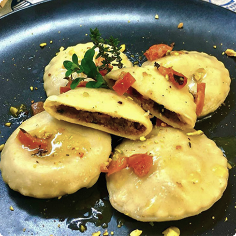 Ravioli stuffed with Rizzoli anchovies and pistachio grains | Rizzoli