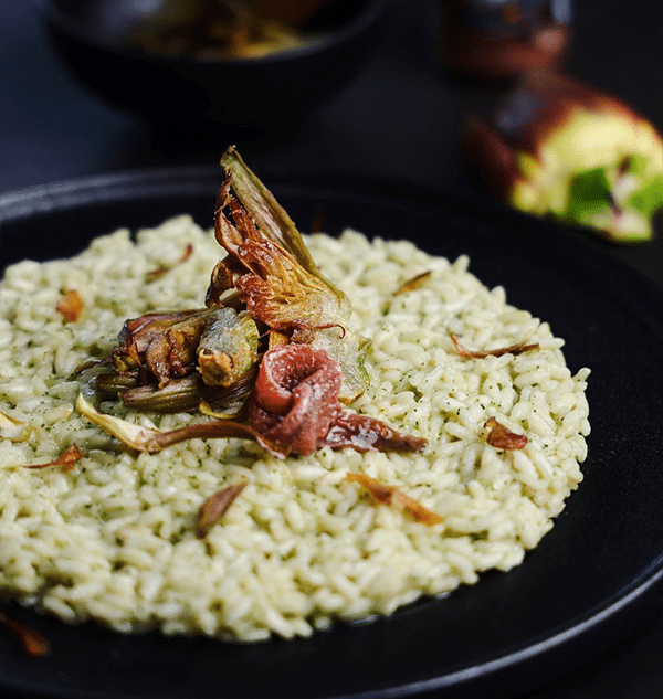 Creamy risotto with pesto, fried artichokes and anchovies | Rizzoli